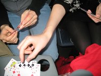 My friend and I, playing cards in the bus