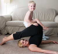 My baby helping with my yoga workout.