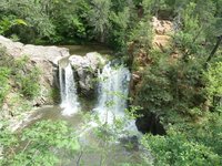 The creek was running rather high last week, water running on both side of the falls.