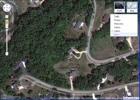 Dinky's place is in the middle of the picture, with the circular driveway