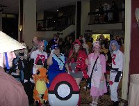 Many pokemon cosplayers.  And the pokeball in the middle is also a cosplayer.