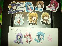 The stickers I got and the chibi Rankas on the envelope (the bottom line are her OCs -- from left to right: Lan, Blanca, Sean and Rankas)